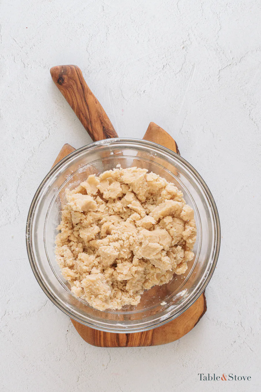 Soft cherry pie bar dough mixed in a glass bowl