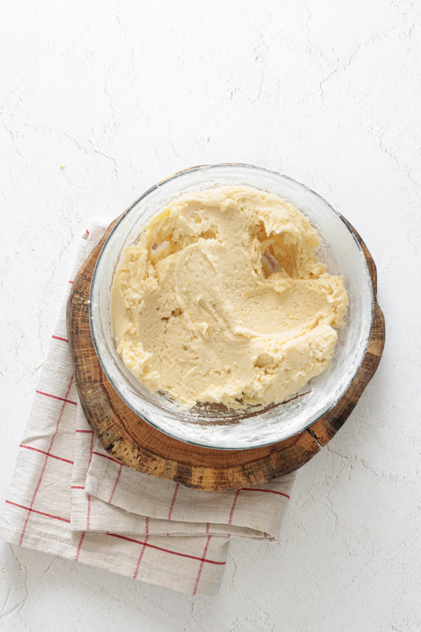 Finished soft lemon cookie dough in a mixing bowl