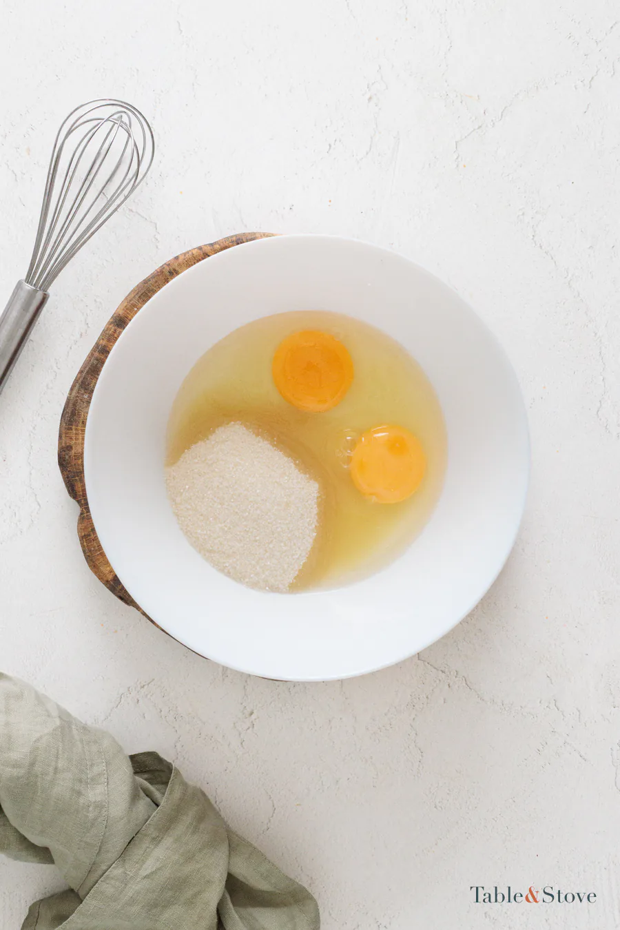Eggs and granulated sugar together in a mixing bowl