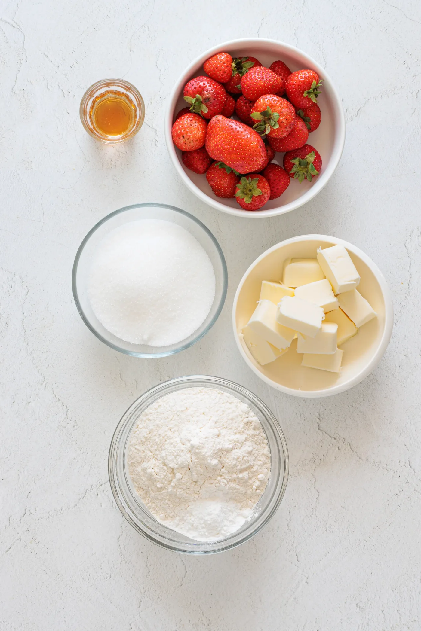 Measured strawberries, sugar, vegan butter, flour, baking powder, and vanilla for strawberry sugar cookies