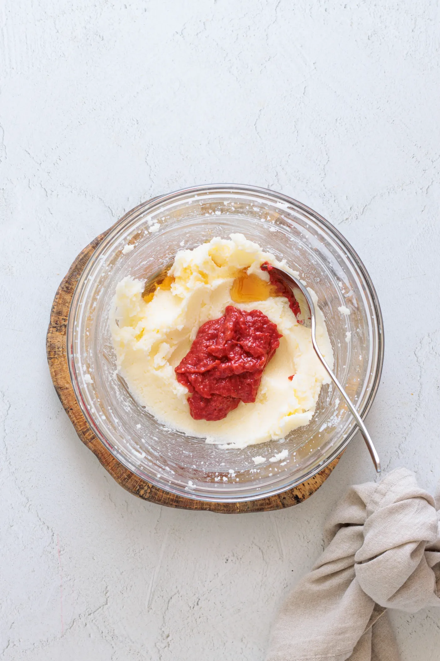 Cooled strawberry reduction and vanilla added to creamed butter and sugar