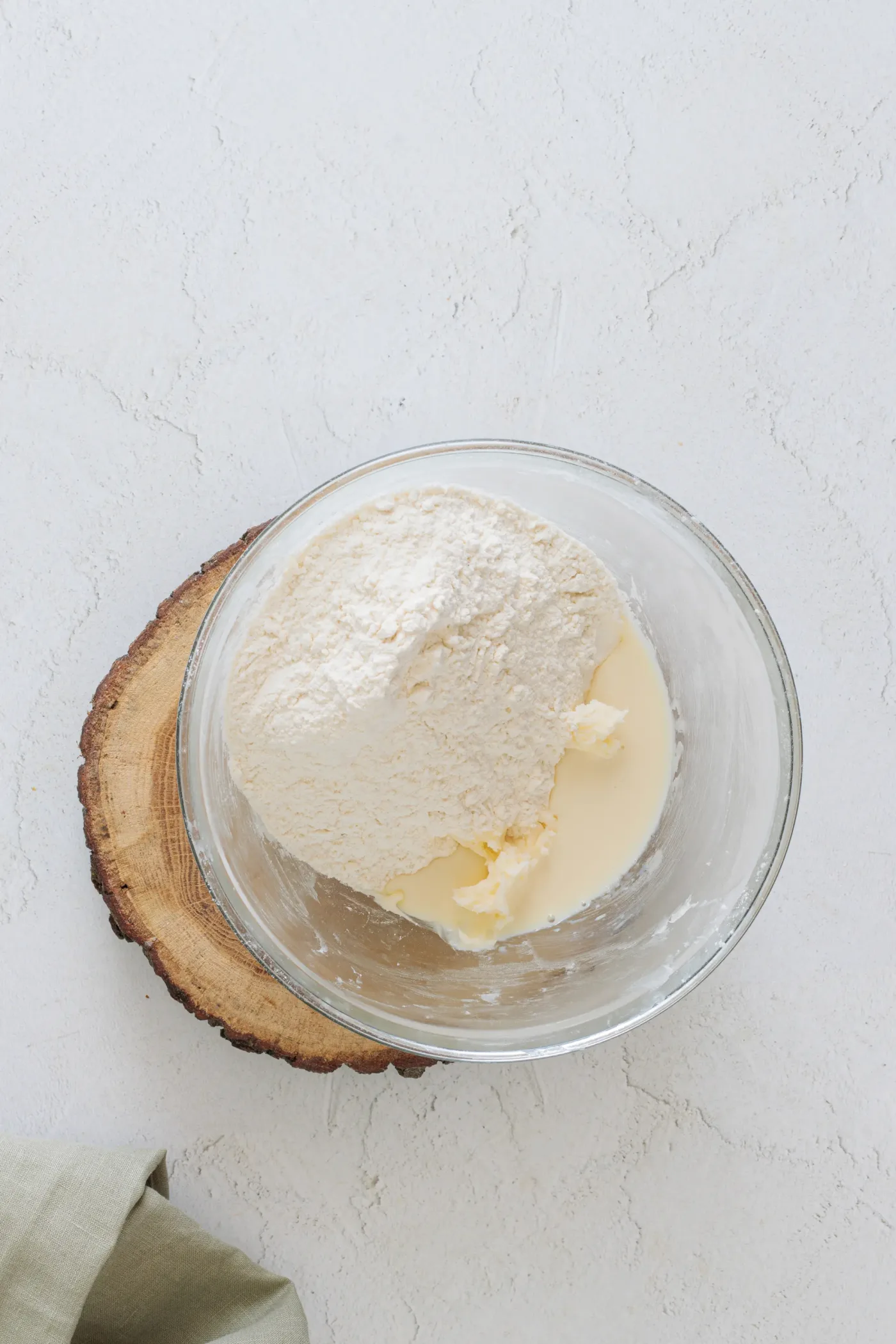 Butter mixture with flour and milk in a glass bowl