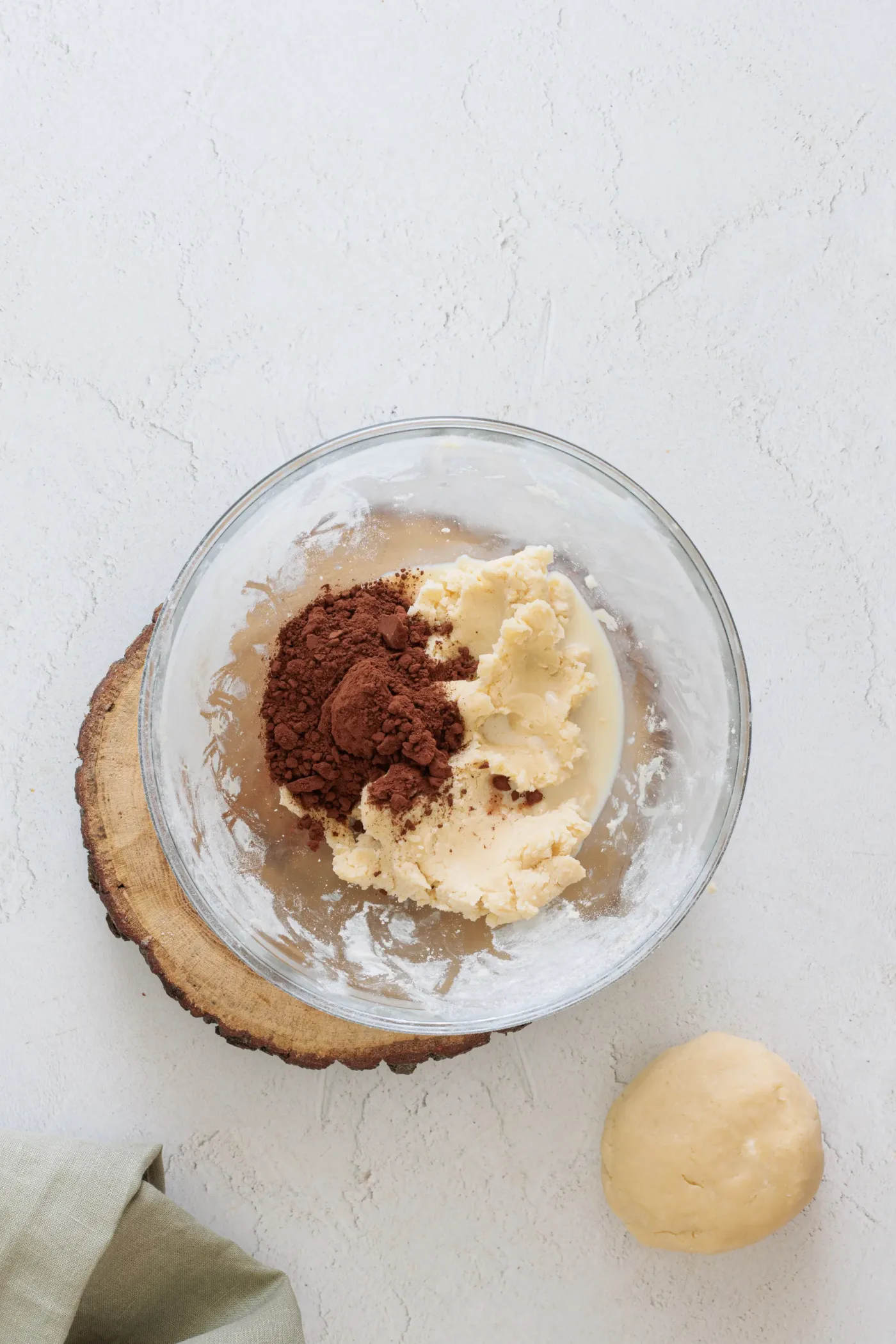 Cocoa powder and milk added to one half of the cookie dough
