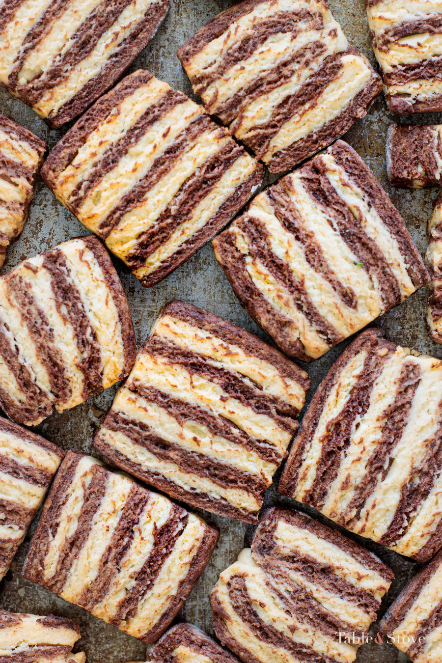 Tray filled with baked vanilla and cocoa zebra cookies
